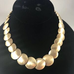 Custom graduated brass disc neclass.